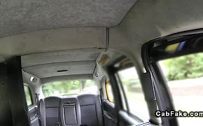 Busty banged from behind in a fake taxi